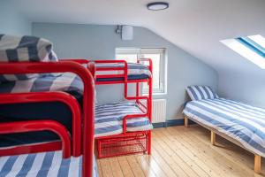 A bed or beds in a room at Otter Hostel Connemara