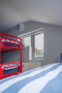 A bed or beds in a room at Otter Hostel Connemara