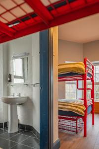 A bed or beds in a room at Otter Hostel Connemara