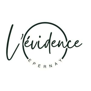 een teken dat zegt excellentie vertegenwoordigd in een cirkel bij L'Evidence, appartement authentique - Epernay in Épernay