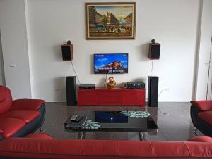 Televisyen dan/atau pusat hiburan di 自在如家獨棟民宿