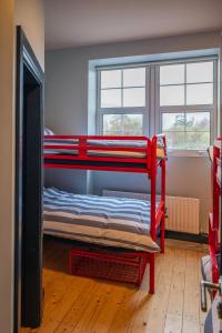 A bed or beds in a room at Otter Hostel Connemara