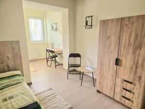 Postel nebo postele na pokoji v ubytování Danubius Szálló