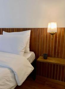 Ένα ή περισσότερα κρεβάτια σε δωμάτιο στο The Alcove Bed and Breakfast +2 φωτογραφίες