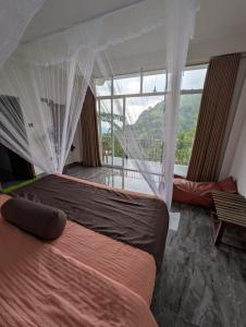Postel nebo postele na pokoji v ubytování Chamodya Home Stay