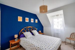 Ένα ή περισσότερα κρεβάτια σε δωμάτιο στο Duplex pour 4 proche du port - 500m de la plage