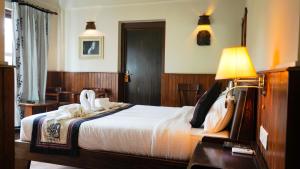 Katil atau katil-katil dalam bilik di Hotel Yechu
