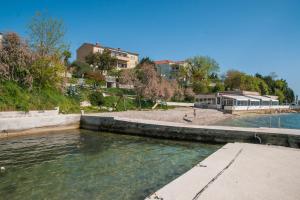 a canal of water with buildings in the background at Giorgio - Fontana in Zadar