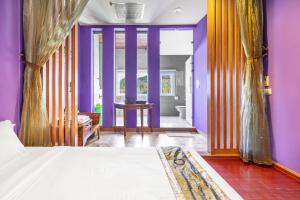 Letto o letti in una camera di Golden Ocean Azure Hotel