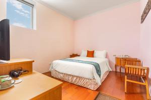 Letto o letti in una camera di Golden Ocean Azure Hotel