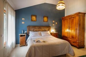 Posteľ alebo postele v izbe v ubytovaní Locanda Tanè