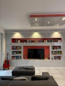 Χώρος καθιστικού στο Stanza in appartamento luminoso e silenzioso