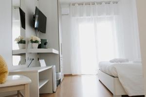 TV a/nebo společenská místnost v ubytování BnB Nuova Vita