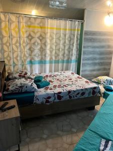 Postel nebo postele na pokoji v ubytování Studio spacieux