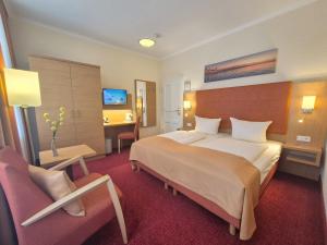 Postel nebo postele na pokoji v ubytování Hotel Villa Meeresgruss