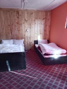 Postel nebo postele na pokoji v ubytování Hotel royal sangam kalinchok