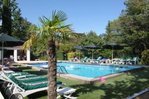 Bazén v ubytování Résidence Miro, gîtes climatisés avec piscine et tennis nebo v jeho okolí