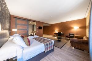 Cama o camas de una habitación en Castilla Termal Burgo de Osma