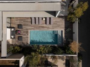 an overhead view of a swimming pool on a building at Villa Yuna Heated Swimming Pool Beach in Cap d'Agde