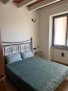 Postel nebo postele na pokoji v ubytování B&B Luna