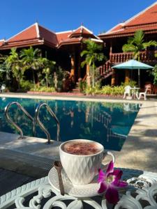 Bazén v ubytování Srey Krob Leak Resort , ស្រីគ្រប់លក្ខណ៌ រីសត nebo v jeho okolí
