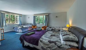 Кровать или кровати в номере Finest Retreats - White House Retreat