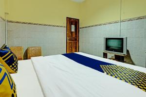 TV a/nebo společenská místnost v ubytování OYO Life 91677 Hotel Citra Dewi 3 + 21 fotografií