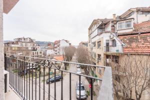 a view of a city street from a balcony at Sea&Park Apartment by Linas BNB in Varna City