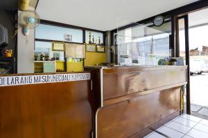 Köök või kööginurk majutusasutuses OYO 91710 Hotel Anugerah