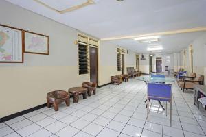 Restoran või mõni muu söögikoht majutusasutuses OYO 91710 Hotel Anugerah