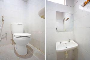Vannituba majutusasutuses OYO 91710 Hotel Anugerah