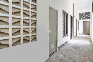 Fotografie z fotogalerie ubytování SPOT ON 91745 Rumah Kost Gresik Syariah v destinaci Gresik