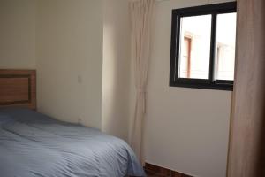 Rúm í herbergi á Luxurious apartment at top location with fantastic mountain view