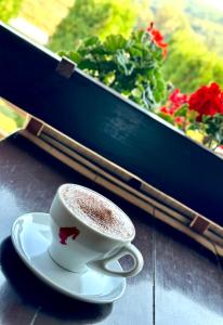 Foto dalla galleria di Pensiunea Cleja a Dobric