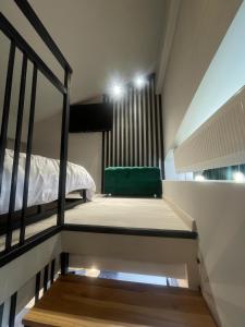 Postel nebo postele na pokoji v ubytování Mondden Penthouse Apartaments