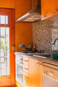 Η κουζίνα ή μικρή κουζίνα στο Appartement à S'Agaro, 1er étage, 3 chambres vue vallée, balcon