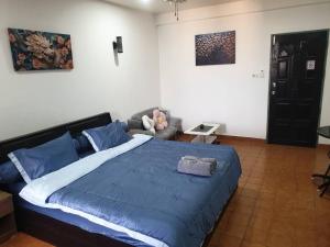 Postel nebo postele na pokoji v ubytování Monkey Apartment