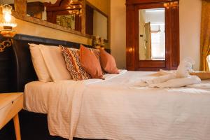 Letto o letti in una camera di Maleth Inn