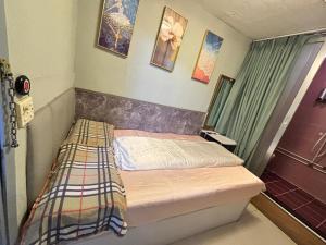 Ένα ή περισσότερα κρεβάτια σε δωμάτιο στο Mabo hotel