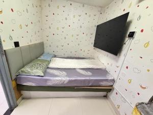 Ένα ή περισσότερα κρεβάτια σε δωμάτιο στο Mabo hotel