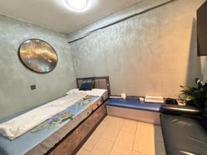 Ένα ή περισσότερα κρεβάτια σε δωμάτιο στο Mabo hotel