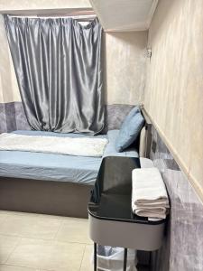 Ένα ή περισσότερα κρεβάτια σε δωμάτιο στο Mabo hotel