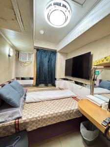 TV a/nebo společenská místnost v ubytování Mabo hotel + 15 fotografií