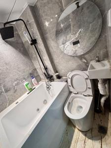 Koupelna v ubytování Mabo hotel