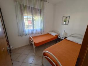 Postel nebo postele na pokoji v ubytování Ketty