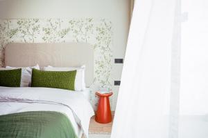 Letto o letti in una camera di Appartement Pro et Cosy parfait pour séjour d'affaires