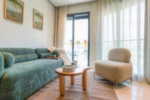 Area soggiorno di Appartement Pro et Cosy parfait pour séjour d'affaires