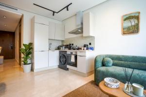 Cucina o angolo cottura di Appartement Pro et Cosy parfait pour séjour d'affaires