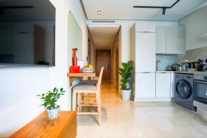 Cucina o angolo cottura di Appartement Pro et Cosy parfait pour séjour d'affaires