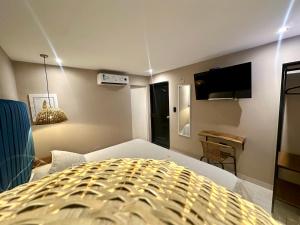 TV a/nebo společenská místnost v ubytování Hotel Londres